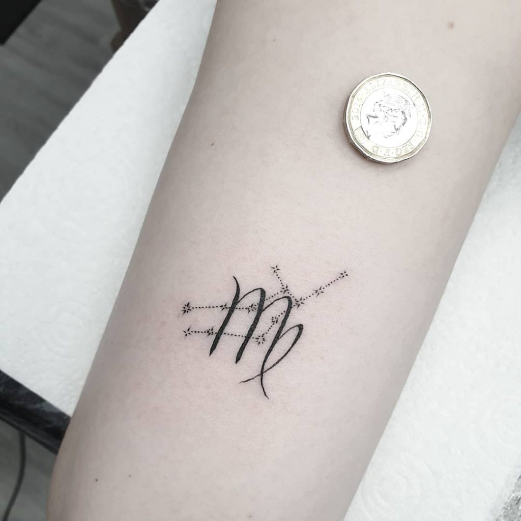 Hand poked virgo constellation tattoo on the right side