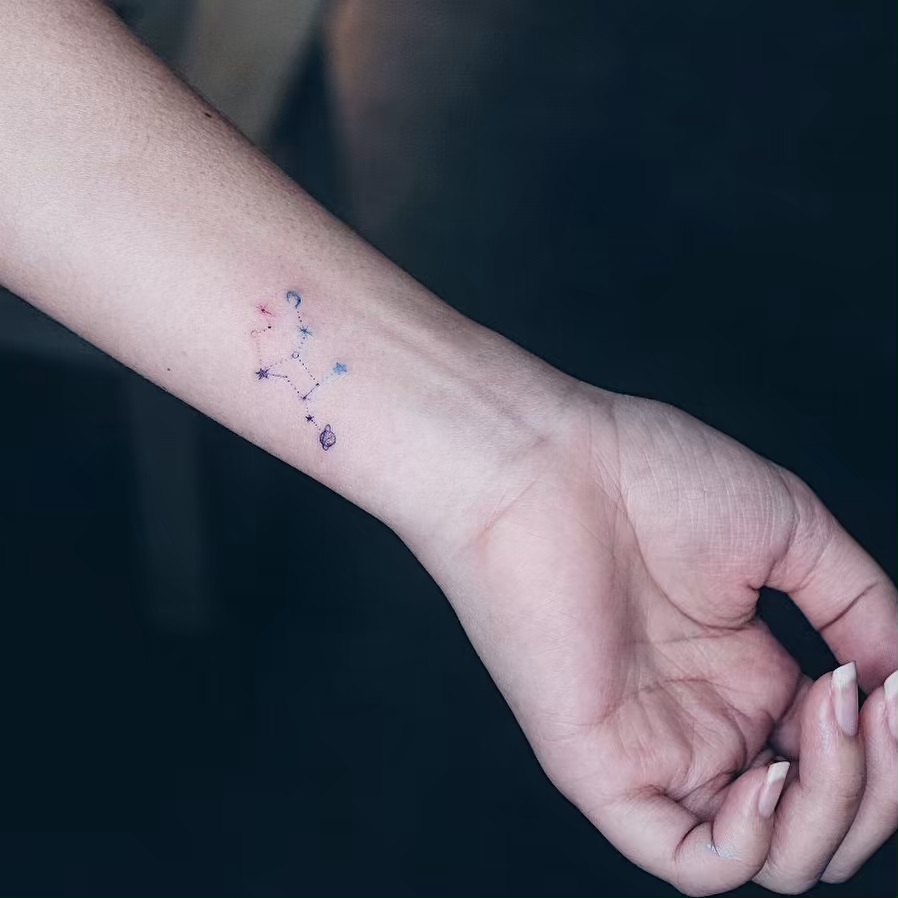 Virgo tattoo on Wrist (inner) - Fine Line style by Christine So