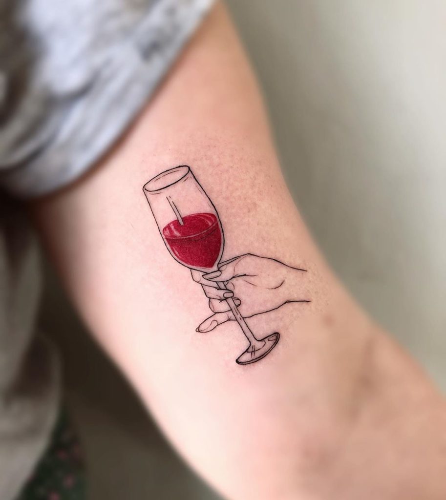 Wine tattoo on Arm (inner) by Ana Maturana