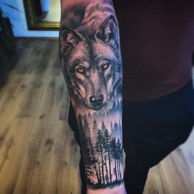 Wolf and Forest Tattoo on Forearm