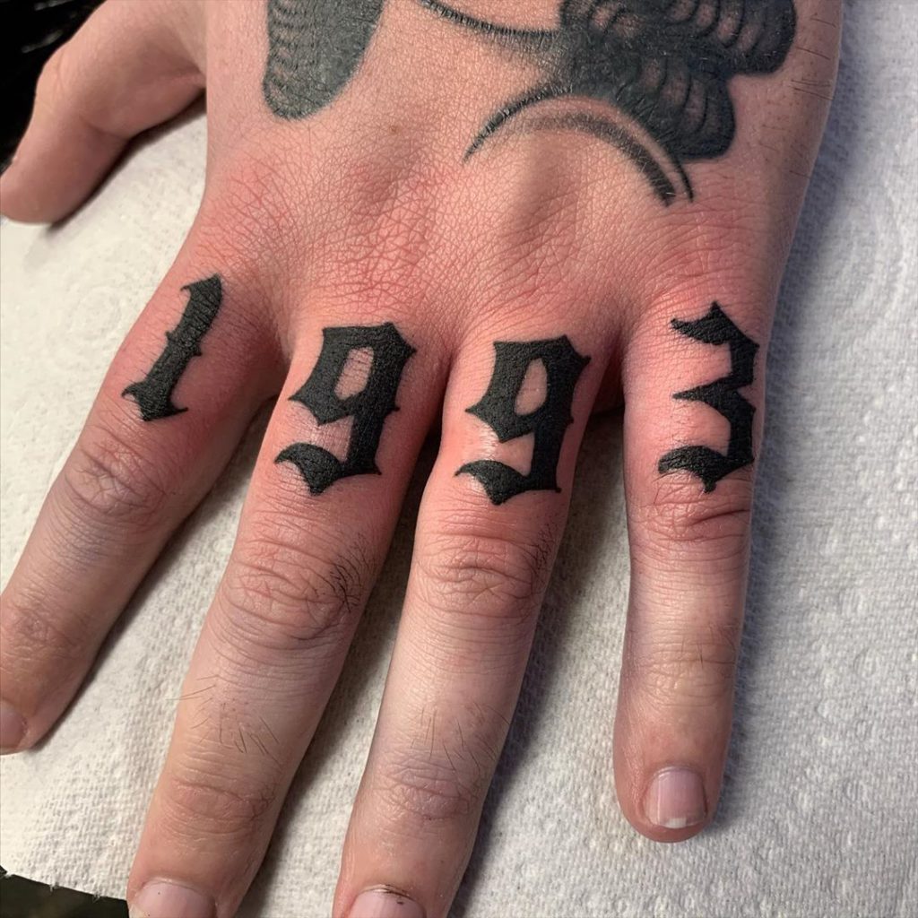 Tattoo on Finger by Ben Roberts
