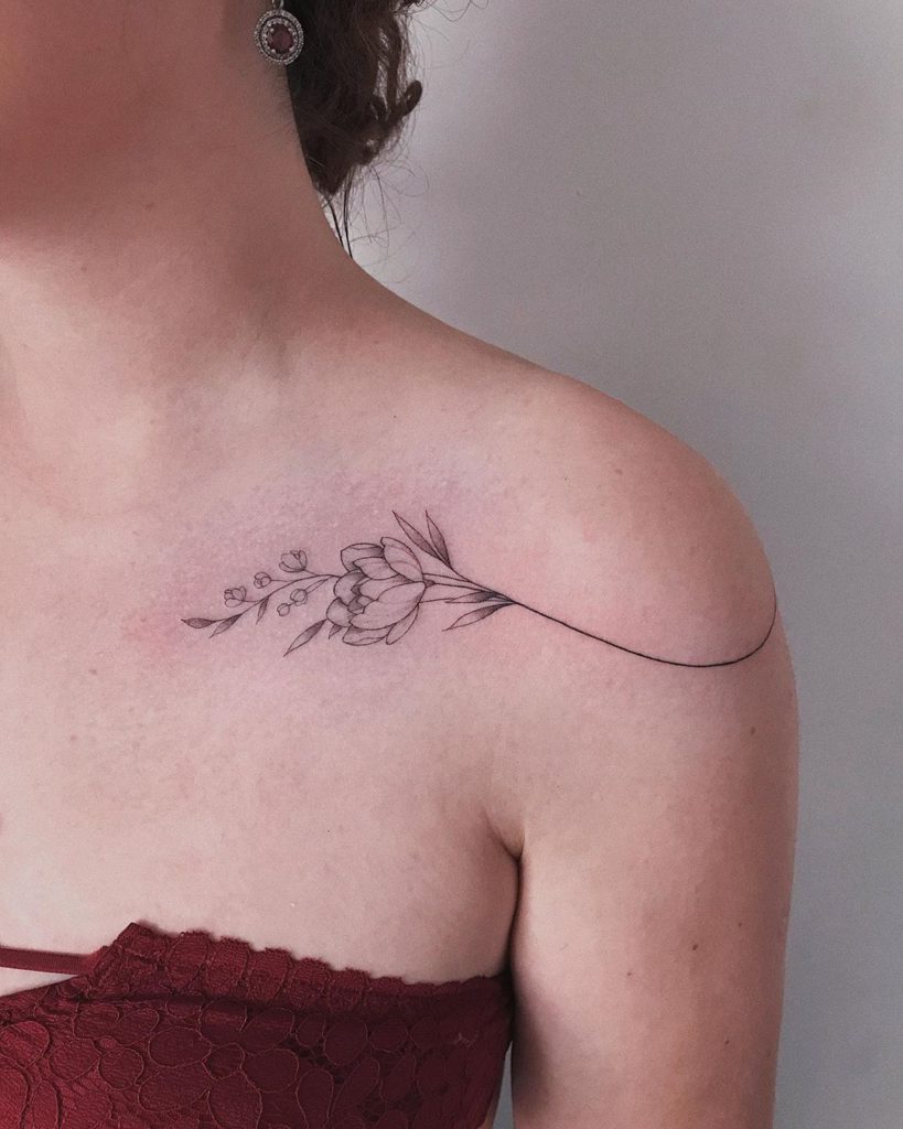 Flower tattoo on Collarbone by Irene Bogachuk