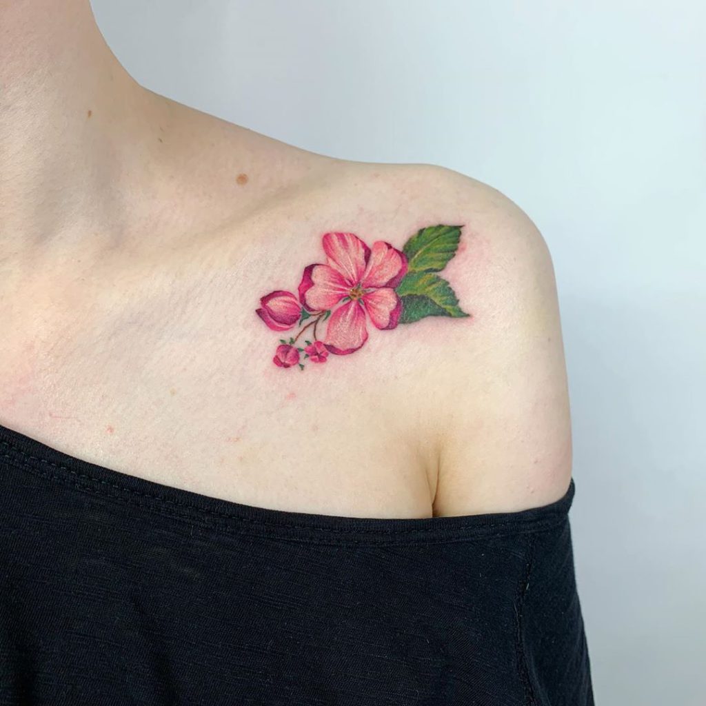 Flower tattoo on Collarbone by Carrot Tattoo
